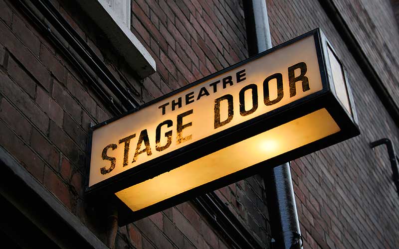 stage door, theatre, Honey G in panto