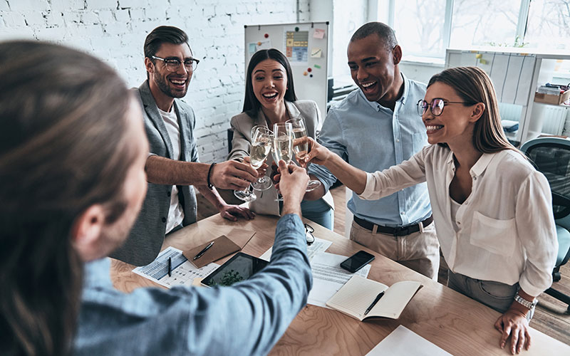 celebrating success with a drink!