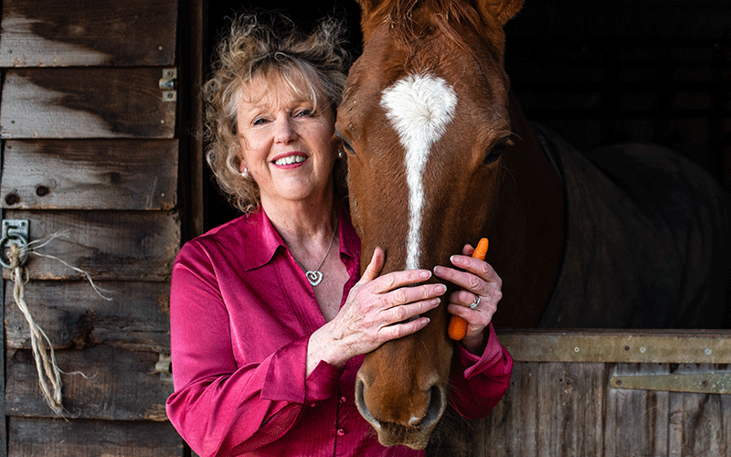 Rosie Tomkins with her horse